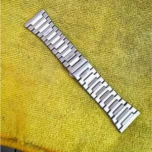 29mm stainless steel watch bracelet with pins and extra links.
